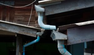 vecteezy_galvanized-rain-gutter-drainage-with-pvc-pipes-in-front-of_26549980 vecteezy_galvanized-rain-gutter-drainage-with-pvc-pipes-in-front-of_26549980